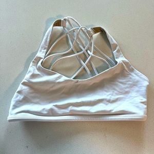 White Lululemon bra. Good condition, worn only a few times. Size 4